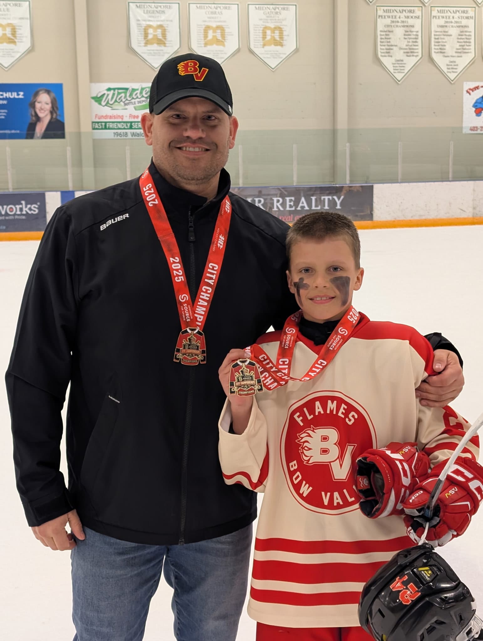 Tyler and Lincoln at the rink with their 2025 City Championships medals